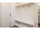 Convenient mudroom with built-in bench, storage cubbies and coat hooks at 213 Big Bradley Dr, Wendell, NC 27591