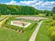 Aerial view of the dog park with separate areas and well-maintained walking paths at 235 Augusta Pond Way # 161, Raleigh, NC 27603