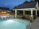 Community pool with covered bar stool seating, lounge chairs, and a lift for accessibility at 235 Augusta Pond Way # 161, Raleigh, NC 27603