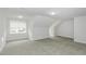 This carpeted bedroom features unique architectural ceiling lines, recessed lighting, and a window at 2570 Sweet Bay Rd, Rocky Mount, NC 27804