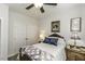 This bedroom features a ceiling fan, closet and vintage furnishings at 2570 Sweet Bay Rd, Rocky Mount, NC 27804