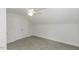 Comfortable carpeted bedroom featuring a ceiling fan and closet at 2570 Sweet Bay Rd, Rocky Mount, NC 27804