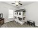 Cozy bedroom featuring a charming house-frame bunk bed, perfect for a room at 2570 Sweet Bay Rd, Rocky Mount, NC 27804