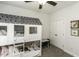 This bedroom features a bunk bed designed like a tiny house and a set of closets at 2570 Sweet Bay Rd, Rocky Mount, NC 27804