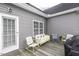 Cozy deck with outdoor seating and a grill, perfect for enjoying outdoor living and entertaining at 2570 Sweet Bay Rd, Rocky Mount, NC 27804