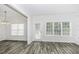 Bright dining area with natural light and wood-look flooring at 2570 Sweet Bay Rd, Rocky Mount, NC 27804
