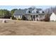 Charming two-story home with a well-manicured lawn and a stone-accented facade at 2570 Sweet Bay Rd, Rocky Mount, NC 27804