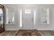 Bright entryway with decorative rug and sidelights at 2570 Sweet Bay Rd, Rocky Mount, NC 27804