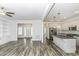 Spacious kitchen with granite countertops, stainless steel appliances, white cabinets, and an island at 2570 Sweet Bay Rd, Rocky Mount, NC 27804