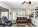 Bright living room with ample natural light, built-in shelving, and comfortable seating at 2570 Sweet Bay Rd, Rocky Mount, NC 27804