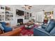 Spacious living area with custom built-ins, fireplace, and plenty of seating at 2570 Sweet Bay Rd, Rocky Mount, NC 27804
