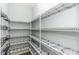 Spacious walk-in pantry with plenty of shelving for ample storage at 2570 Sweet Bay Rd, Rocky Mount, NC 27804
