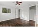 Bedroom featuring hardwood floors, ceiling fan, closet, and natural light at 2603 Legion Ave, Durham, NC 27707