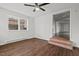 Bright living room with hardwood floors and large windows at 2603 Legion Ave, Durham, NC 27707