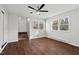 Bright living room with plenty of natural light, ceiling fan, and closet at 2603 Legion Ave, Durham, NC 27707