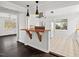 Inviting open layout: living room, dining area, and kitchen with bar seating at 2603 Legion Ave, Durham, NC 27707