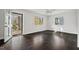 Bright living room with beautiful hardwood floors and an open entry way at 2603 Legion Ave, Durham, NC 27707