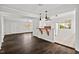 Open-concept living room with hardwood floors and views into the kitchen at 2603 Legion Ave, Durham, NC 27707