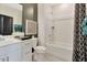 Well-lit bathroom featuring a shower-tub combo, modern vanity, and stylish decor at 2715 Hunter Woods Dr # 562, Apex, NC 27502
