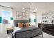 Modern bedroom features patterned ceiling, sleek furniture, and plenty of natural light at 2715 Hunter Woods Dr # 562, Apex, NC 27502
