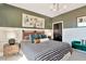 Beautiful bedroom featuring modern lighting fixture, stylish decor and attractive furniture at 2715 Hunter Woods Dr # 562, Apex, NC 27502