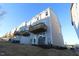 Rear view of modern townhomes with private balconies and well-maintained landscaping at 2715 Hunter Woods Dr # 562, Apex, NC 27502