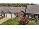Aerial view of a brick home featuring mature landscaping at 3027 Maple Ave # D2, Burlington, NC 27215