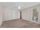 Spacious bedroom includes neutral carpeting, closet, and a convenient ensuite bathroom, promoting comfort and privacy at 3027 Maple Ave # D2, Burlington, NC 27215