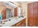 Bathroom showcasing a vanity and a view of a second doorway at 3412 Hackney Ct, Raleigh, NC 27613