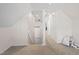 Open attic featuring carpet, white walls, and plenty of space at 400 Cedarmere Dr, Wendell, NC 27591