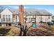 Exterior image of a home's backyard featuring a wooden deck at 400 Cedarmere Dr, Wendell, NC 27591