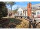 Backyard of a home featuring a wooden deck and lush green lawn at 400 Cedarmere Dr, Wendell, NC 27591