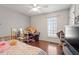 Bedroom featuring ceiling fan, window and a bed at 400 Cedarmere Dr, Wendell, NC 27591