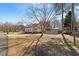 Charming home featuring dormer windows, a brick foundation, and a welcoming front porch with white railings at 400 Cedarmere Dr, Wendell, NC 27591