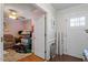 Inviting hallway with views of the front door and a doorway leading to another room at 400 Cedarmere Dr, Wendell, NC 27591