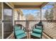 Relaxing covered patio featuring comfortable seating and a view at 401 Oak Hollow Ct, Raleigh, NC 27613