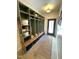 Mud room with built-in storage and seating at 42 Miry Branch Ct, Garner, NC 27529