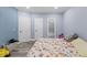 Relaxing bedroom with wood-look floors, walk in closet, and ensuite bathroom at 5904 River Lake Cir, Raleigh, NC 27604