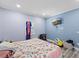 Spacious bedroom with wood-look floors and plenty of space for storage at 5904 River Lake Cir, Raleigh, NC 27604