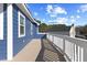 A bright deck with white railing offers relaxing outdoor space with a clear view at 5904 River Lake Cir, Raleigh, NC 27604