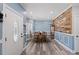 Charming dining room featuring hardwood floors and a rustic accent wall at 5904 River Lake Cir, Raleigh, NC 27604