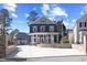 Beautiful two-story home with a welcoming front porch and well-manicured lawn at 5904 River Lake Cir, Raleigh, NC 27604
