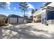 Spacious garage with ample parking on a sunny day, complementing the home's exterior and backyard design at 5904 River Lake Cir, Raleigh, NC 27604