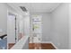Hallway with wood floors leading to other rooms at 5904 River Lake Cir, Raleigh, NC 27604