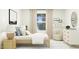 Cozy bedroom featuring modern decor, comfortable bed, and ample natural light at 601 Morning Light Dr, Angier, NC 27501