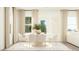 Inviting dining area with round table, cushioned chairs, and decorative rug at 601 Morning Light Dr, Angier, NC 27501