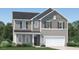Charming two-story home with stone accents, a two-car garage, and a welcoming front porch at 601 Morning Light Dr, Angier, NC 27501
