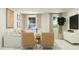 Cozy living room featuring chairs, contemporary decor, artwork, and foosball table at 601 Morning Light Dr, Angier, NC 27501