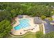 An overhead view of the community pool, featuring a splashpad and lots of lounge chairs at 601 Walcott Way, Cary, NC 27519