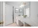 Bathroom featuring sink, vanity and framed mirror at 601 Walcott Way, Cary, NC 27519
